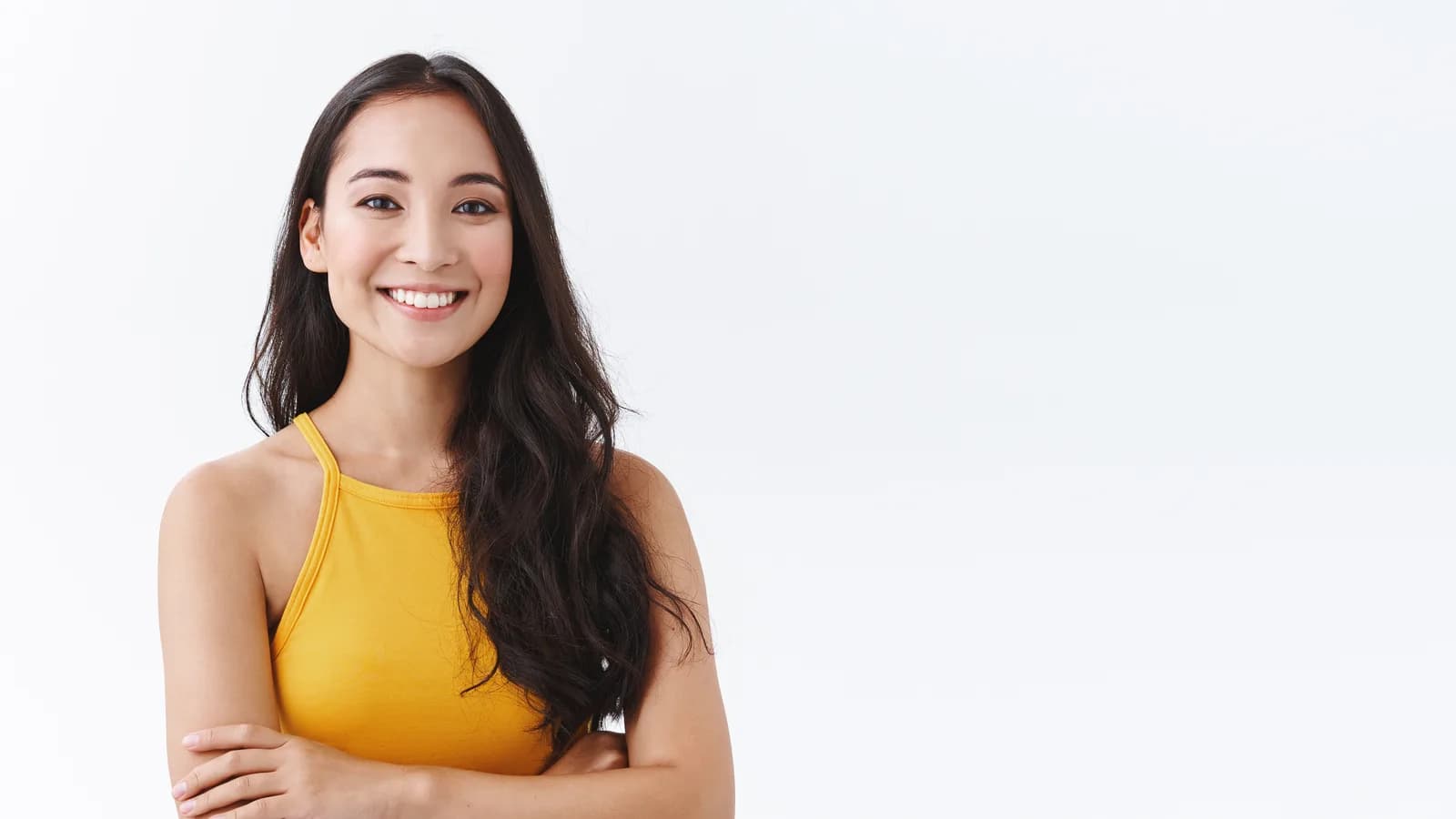 A woman smiling with bright, white teeth